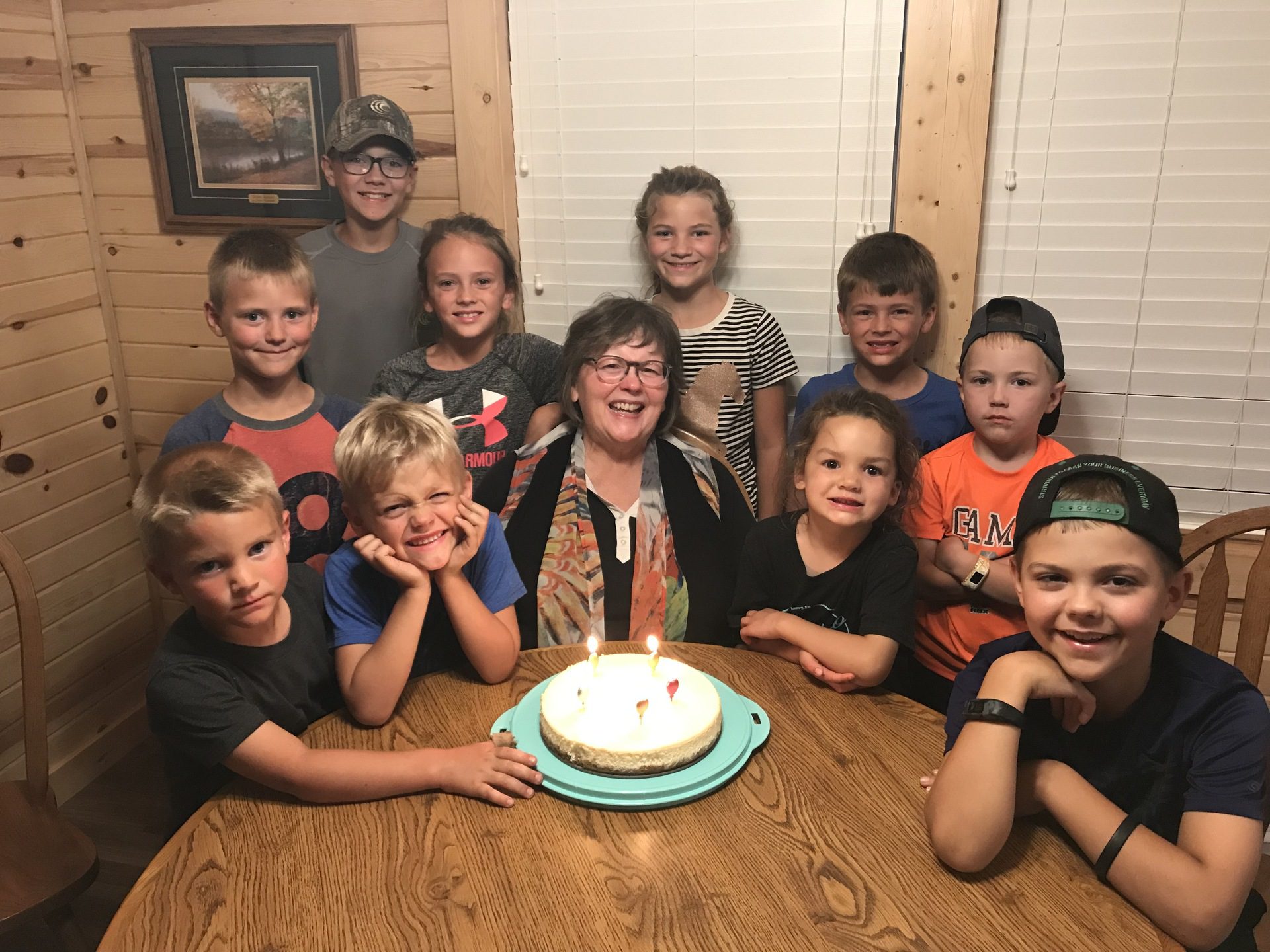 Georgia surrounded by 10 grandkids